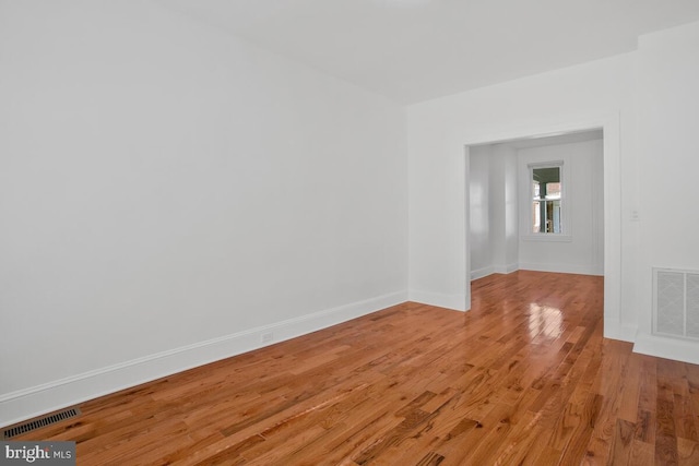 unfurnished room featuring light hardwood / wood-style floors