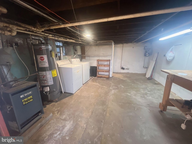 basement with separate washer and dryer and gas water heater