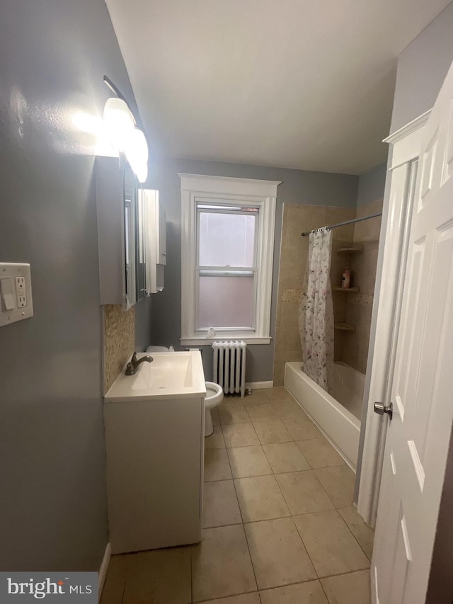 full bathroom with vanity, radiator, tile patterned floors, toilet, and shower / tub combo