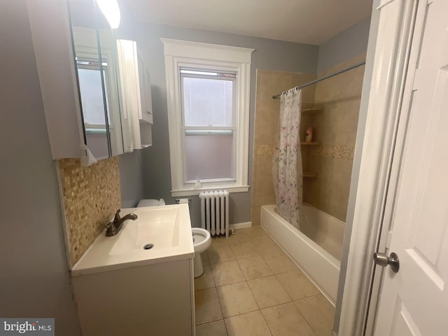 full bathroom featuring shower / bath combo, radiator, vanity, tile patterned flooring, and toilet