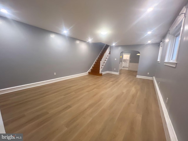 unfurnished living room featuring light wood-type flooring