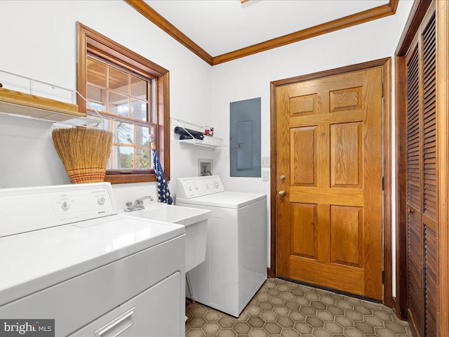 washroom featuring independent washer and dryer, electric panel, and ornamental molding