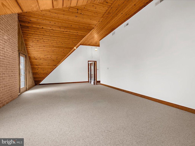 bonus room featuring carpet floors, wooden ceiling, and lofted ceiling