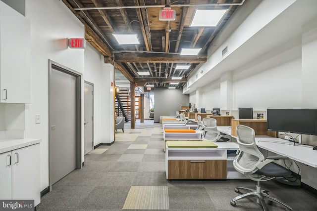 home office featuring light carpet