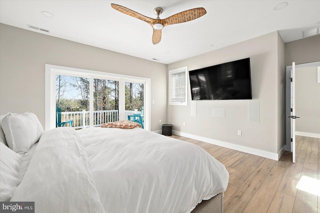 bedroom featuring access to exterior, light hardwood / wood-style flooring, and ceiling fan