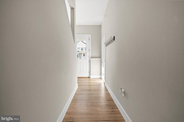 corridor featuring light hardwood / wood-style flooring