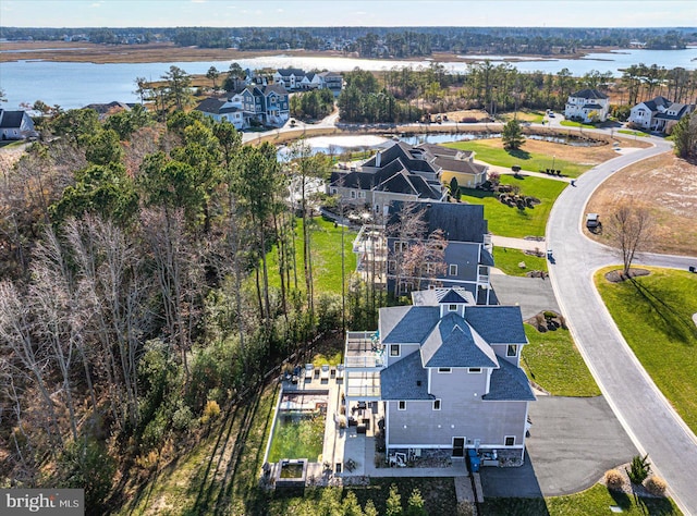 drone / aerial view featuring a water view