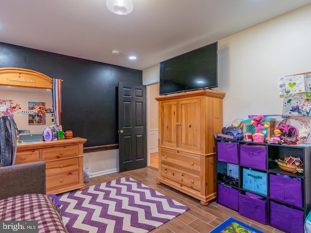 rec room featuring hardwood / wood-style floors