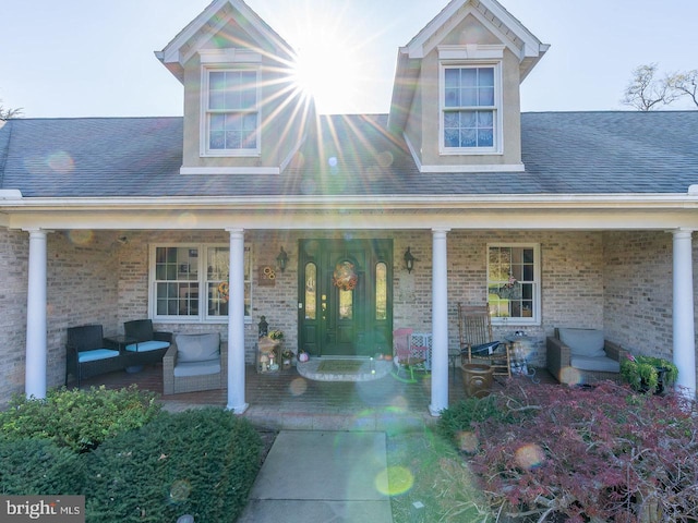 doorway to property with a porch