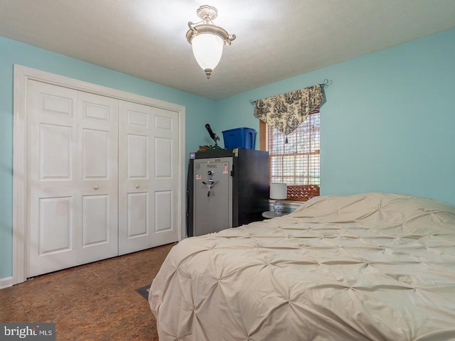 carpeted bedroom featuring a closet