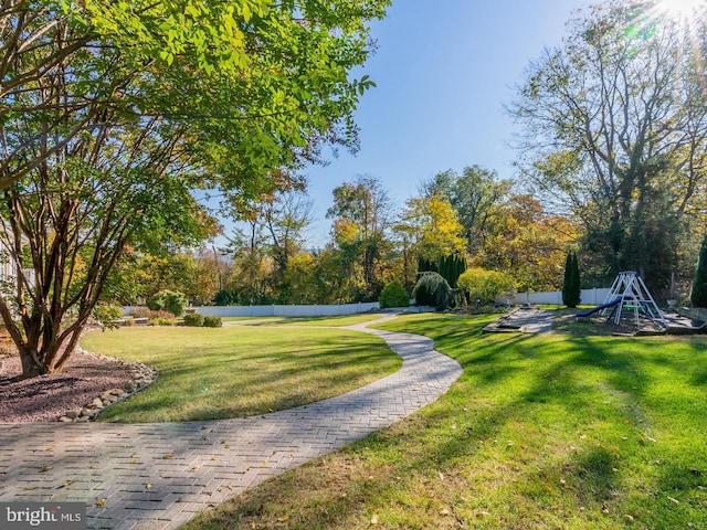 view of community featuring a lawn