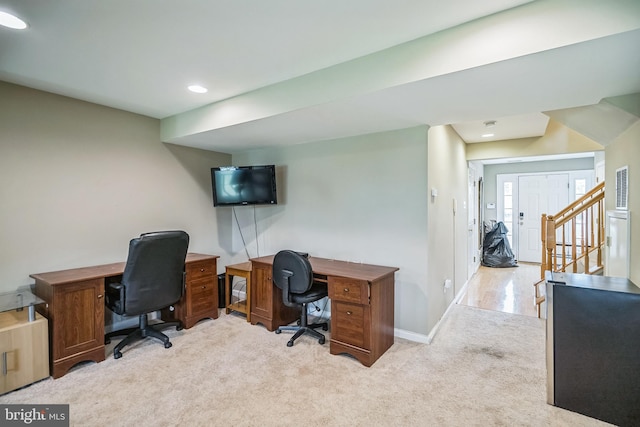 office area with light colored carpet