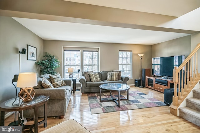 living room with light hardwood / wood-style floors