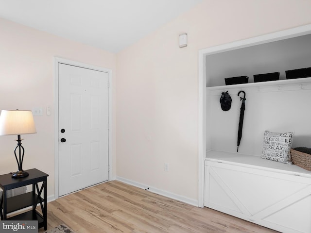 entryway with light hardwood / wood-style floors