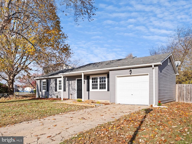 single story home with a garage