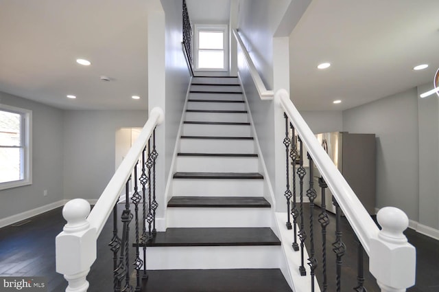 stairway with wood-type flooring