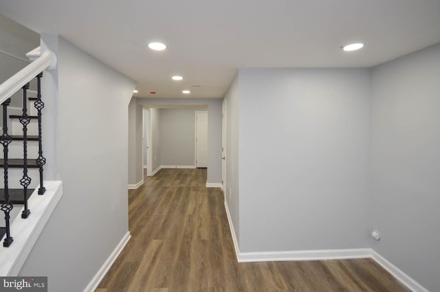 hall featuring dark wood-type flooring