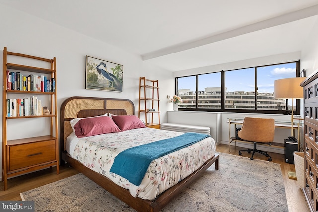 bedroom featuring wood-type flooring