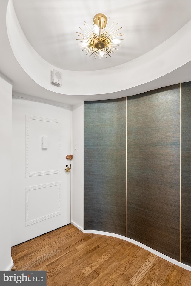 foyer entrance with hardwood / wood-style floors