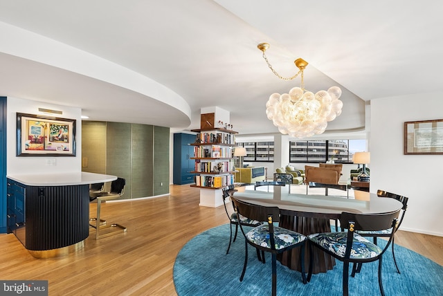 2510 Virginia Ave NW Unit 1104-N, Washington, DC 20037 - dining space with a chandelier and light wood finished floors