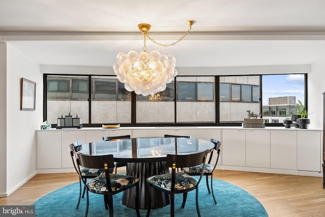 2510 Virginia Ave NW Unit 1104-N, Washington, DC 20037 - dining area with a chandelier and light wood-style floors