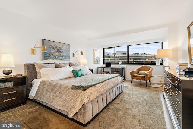 bedroom with wood-type flooring