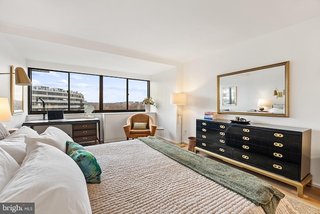 2510 Virginia Ave NW Unit 1104-N, Washington, DC 20037 - bedroom with wood finished floors and baseboards
