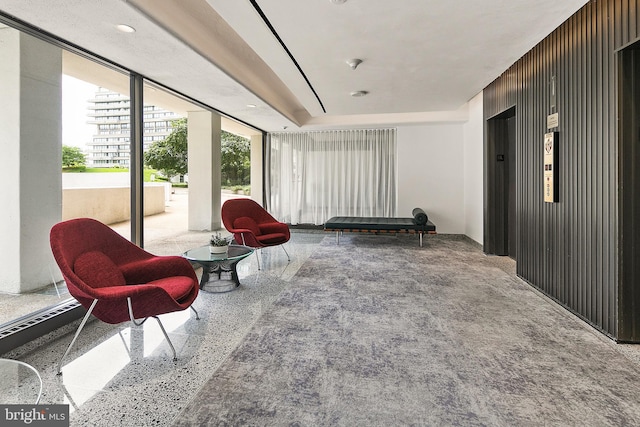 2510 Virginia Ave NW Unit 1104-N, Washington, DC 20037 - sitting room with elevator and speckle patterned floor