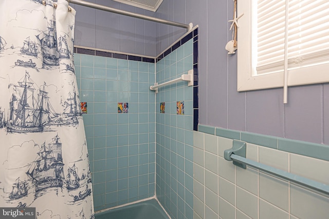 bathroom featuring shower / bath combination with curtain