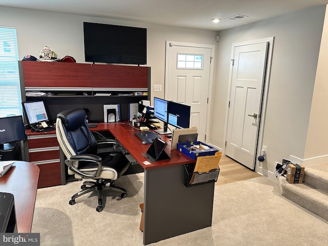 home office featuring light hardwood / wood-style flooring