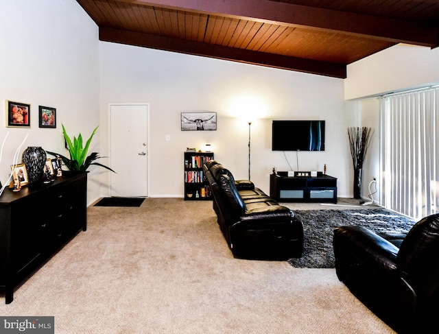 carpeted living room featuring vaulted ceiling with beams and wood ceiling