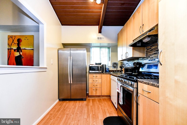 kitchen featuring stainless steel appliances, beam ceiling, wooden ceiling, dark stone countertops, and light hardwood / wood-style floors