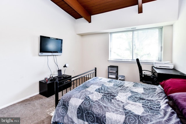 bedroom with vaulted ceiling with beams, carpet, and wood ceiling