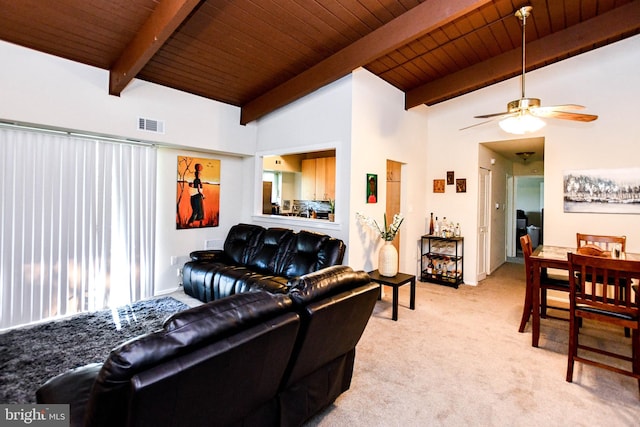 carpeted living room featuring beam ceiling, high vaulted ceiling, ceiling fan, and wooden ceiling