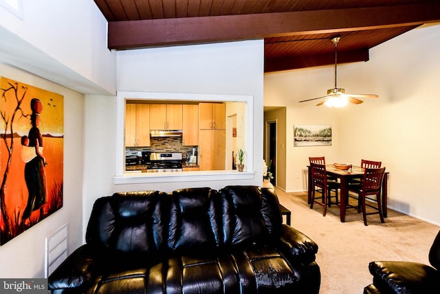 carpeted living room featuring beam ceiling, ceiling fan, and wooden ceiling