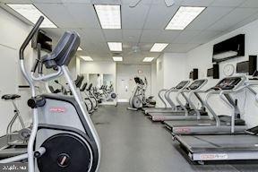 gym with a drop ceiling