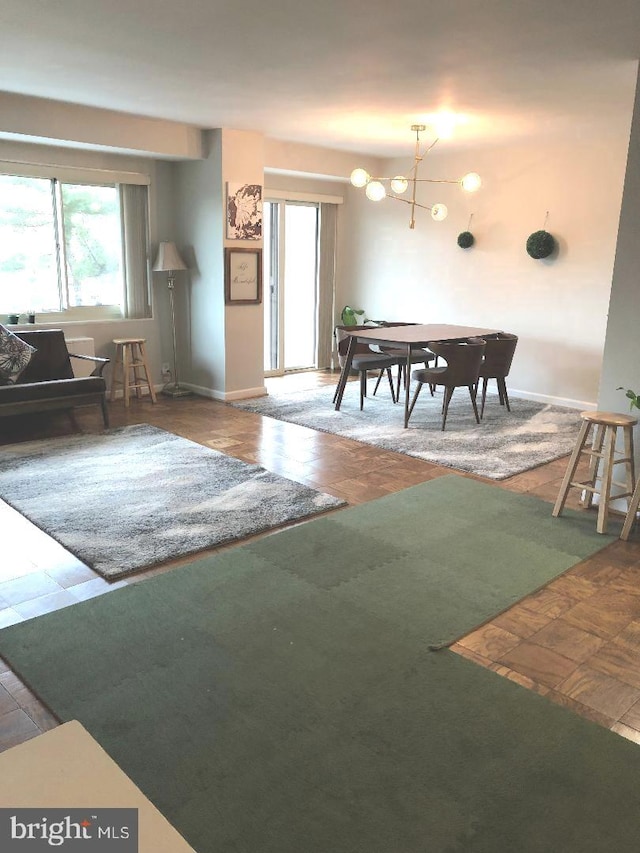 playroom with a notable chandelier