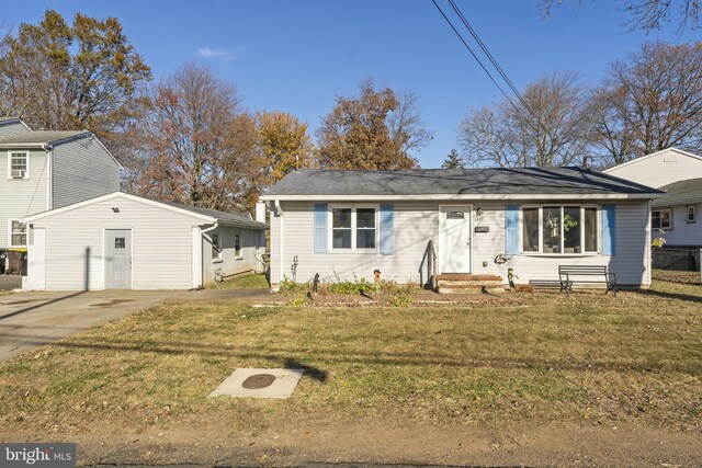 bungalow-style home with entry steps and a front lawn