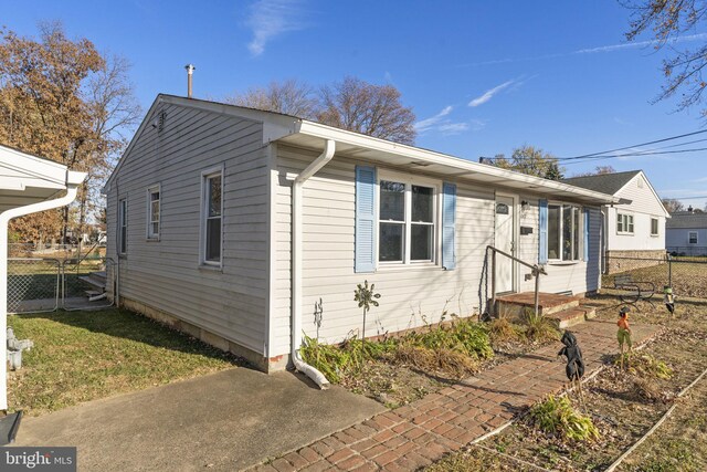 view of front of home with fence