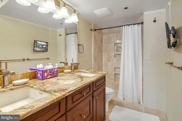 bathroom featuring walk in shower, tile patterned floors, crown molding, toilet, and vanity