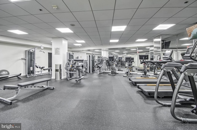 gym with a drop ceiling