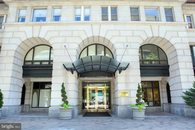 601 Pennsylvania Ave NW Unit 1003N, Washington, DC 20004 - view of exterior entry with french doors and stone siding
