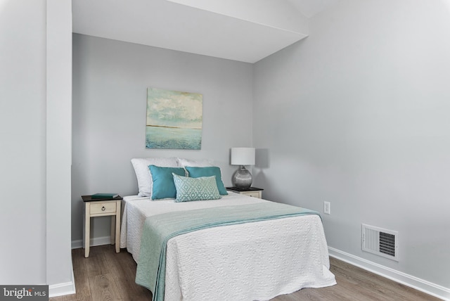 bedroom featuring wood-type flooring