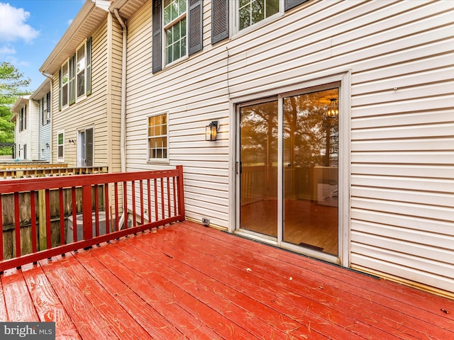 wooden deck featuring central air condition unit