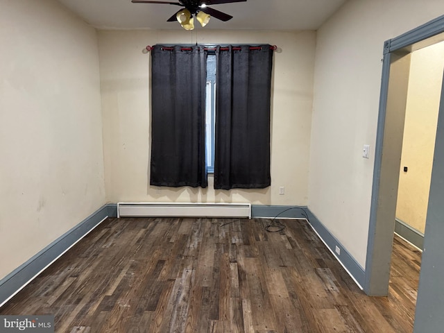 empty room featuring ceiling fan, dark hardwood / wood-style flooring, and a baseboard radiator