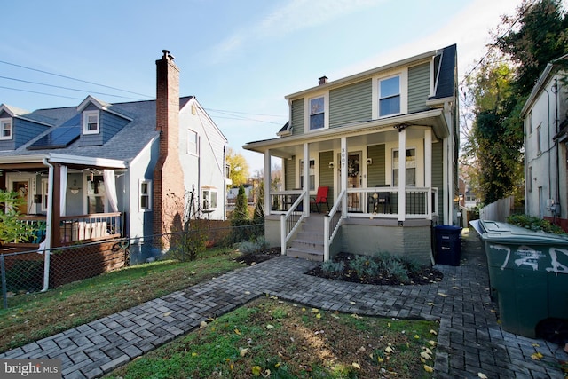 view of front of home featuring covered porch