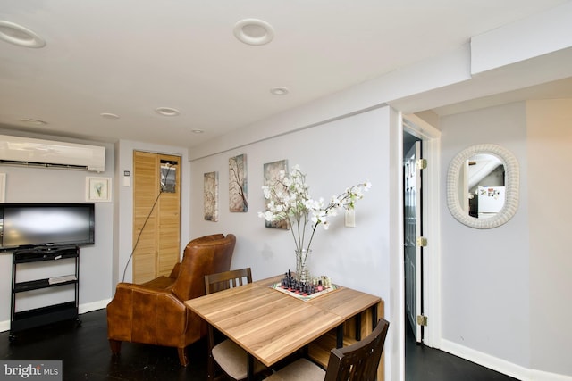 dining area featuring a wall mounted air conditioner