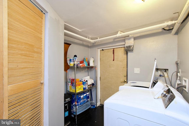 washroom featuring independent washer and dryer