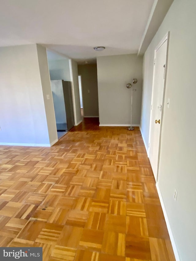 hall with light parquet floors