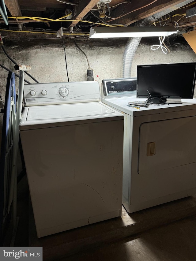 laundry area featuring separate washer and dryer